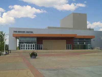 The Dekker Centre seen from Rotary Plaza with a blue sky behind it.